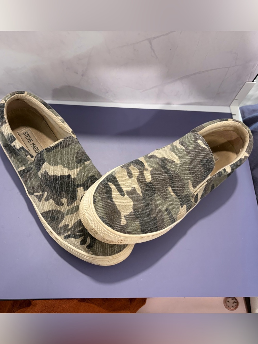 Steve Madden women’s Camo Slip-On Sneakers in Green and Tan